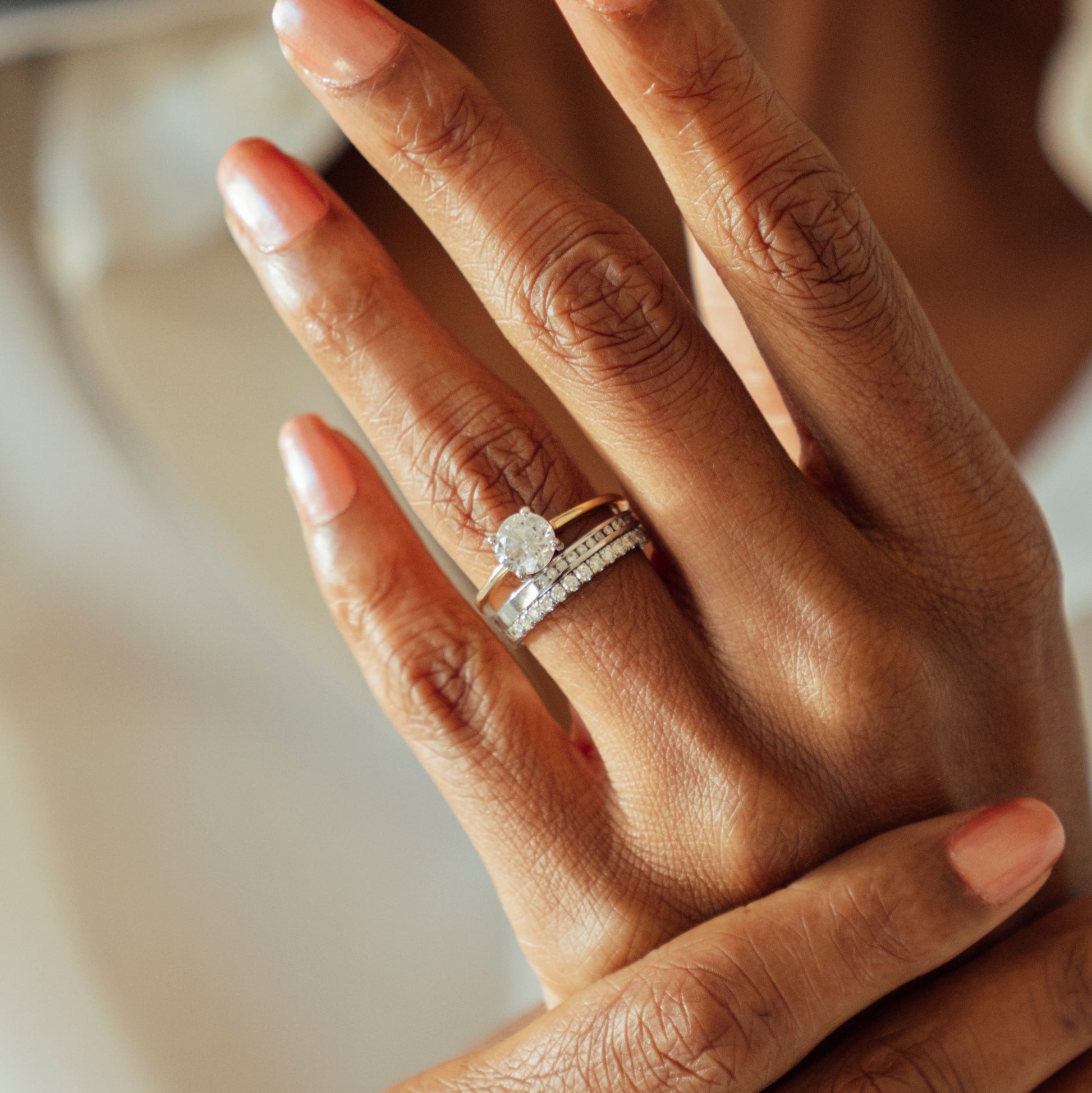 Solitaire ring with diamonds around it Clearance